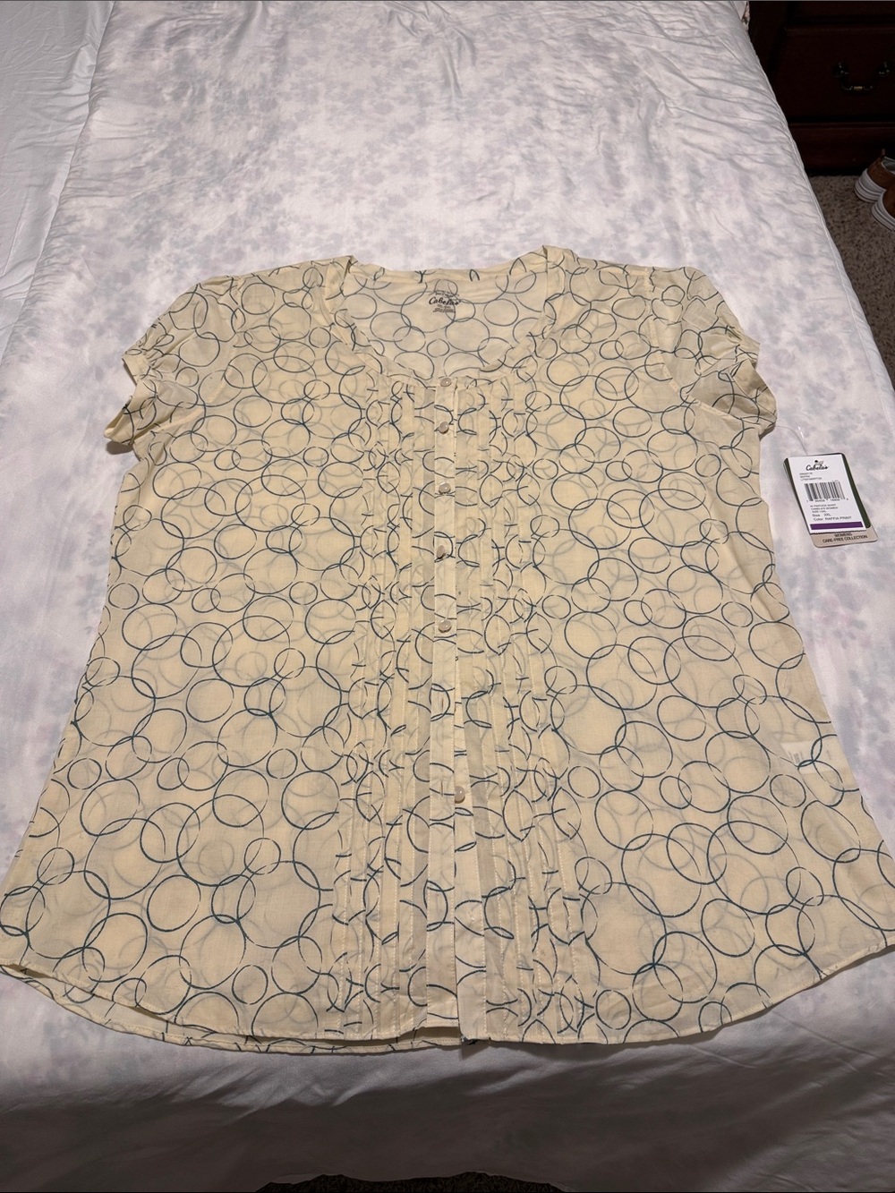 Cream Short-Sleeve Ruffle Front Blouse with Navy Circle Print